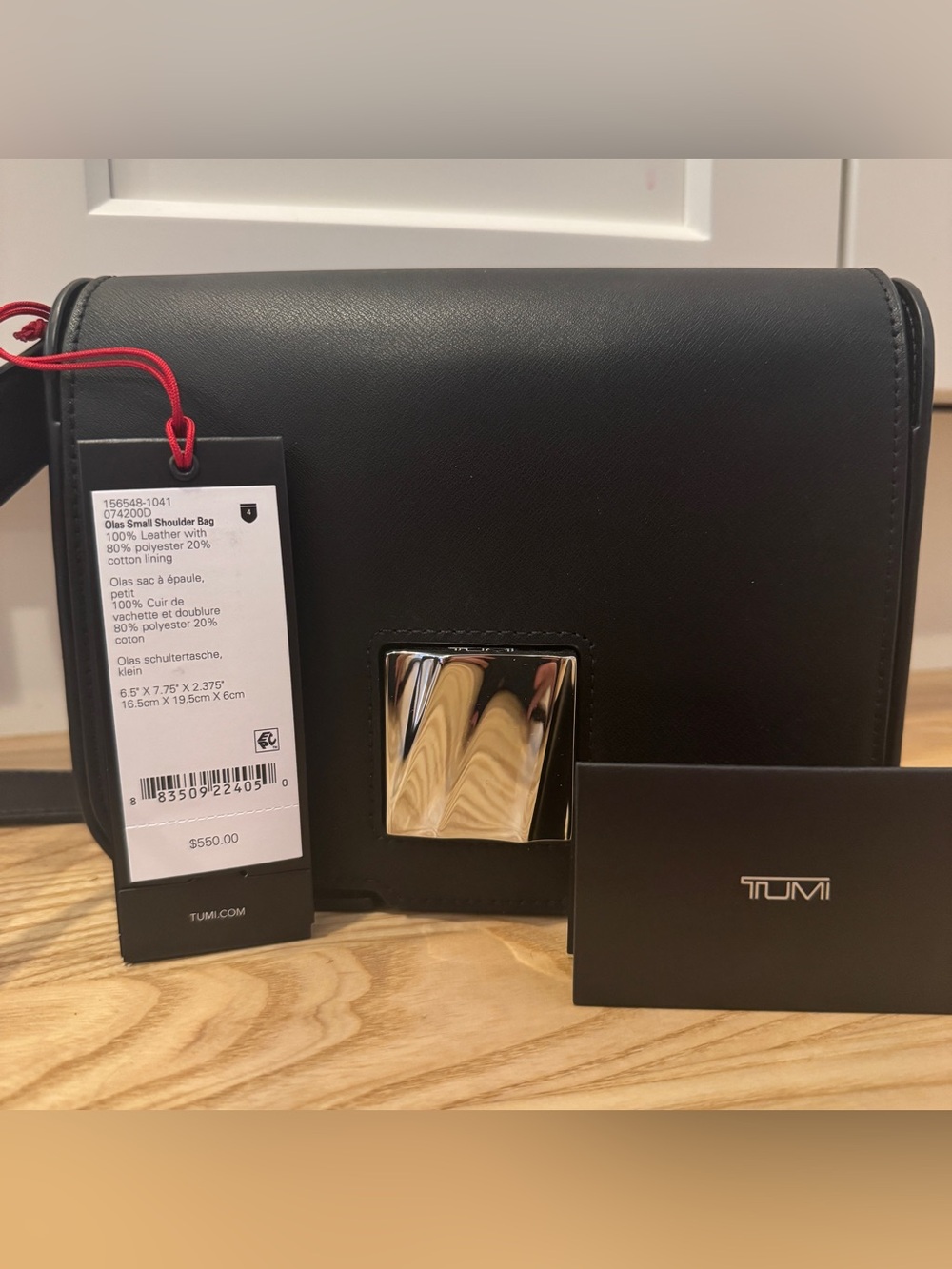 Tumi Black Leather Shoulder Bag with Polished Silver-Tone Clasp